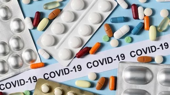 Cấp ph&eacute;p sản xuất thuốc trị Covid-19 cho 3 c&ocirc;ng ty trong nước - Ảnh 1.