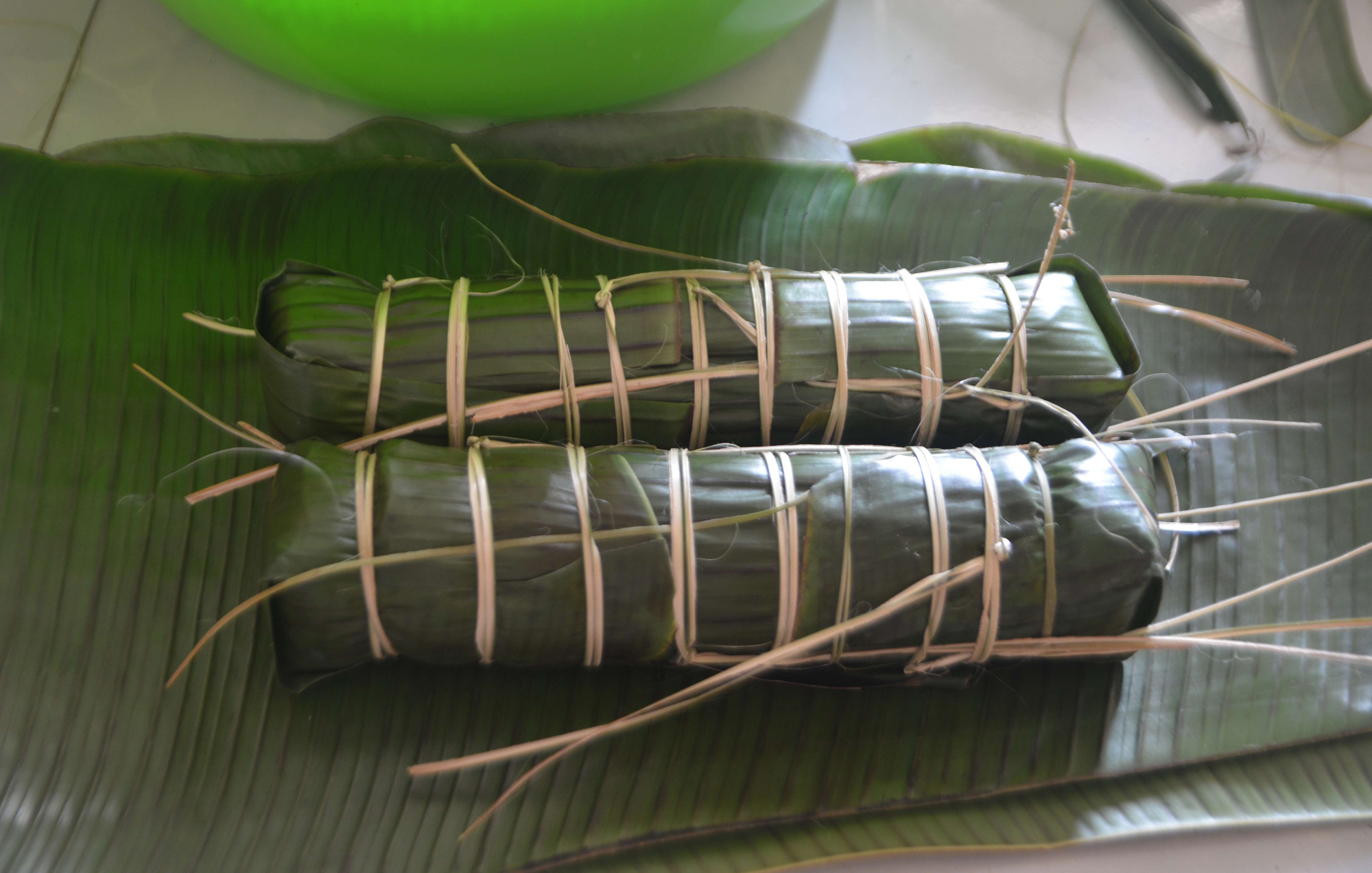 Cuộc thi B&ecirc;n nhau ng&agrave;y Tết: B&aacute;nh t&eacute;t tro đi c&ugrave;ng củ kiệu - Ảnh 1.