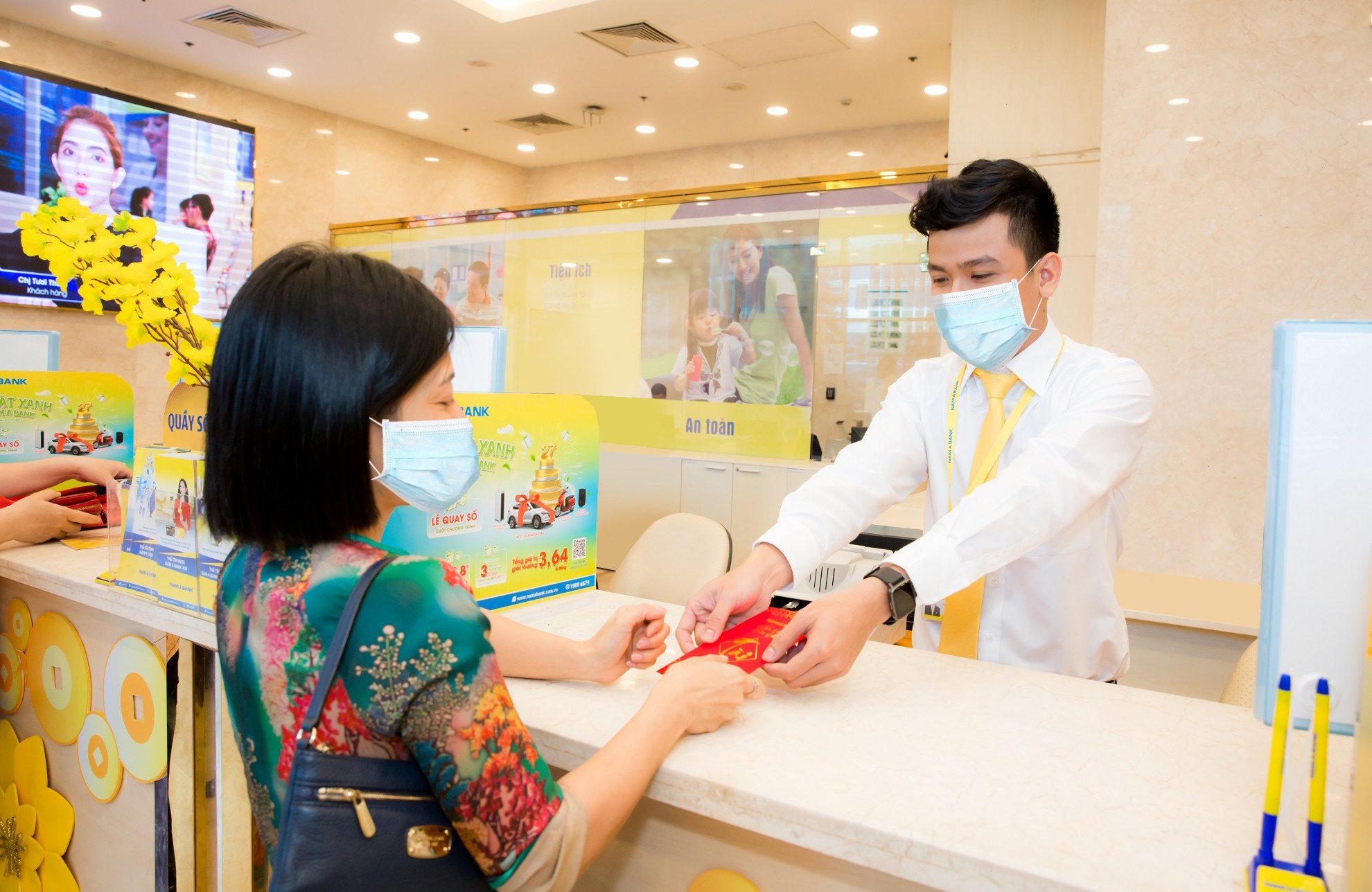 Giao dịch đầu năm nhận ngay l&igrave; x&igrave; từ Nam A Bank - Ảnh 1.