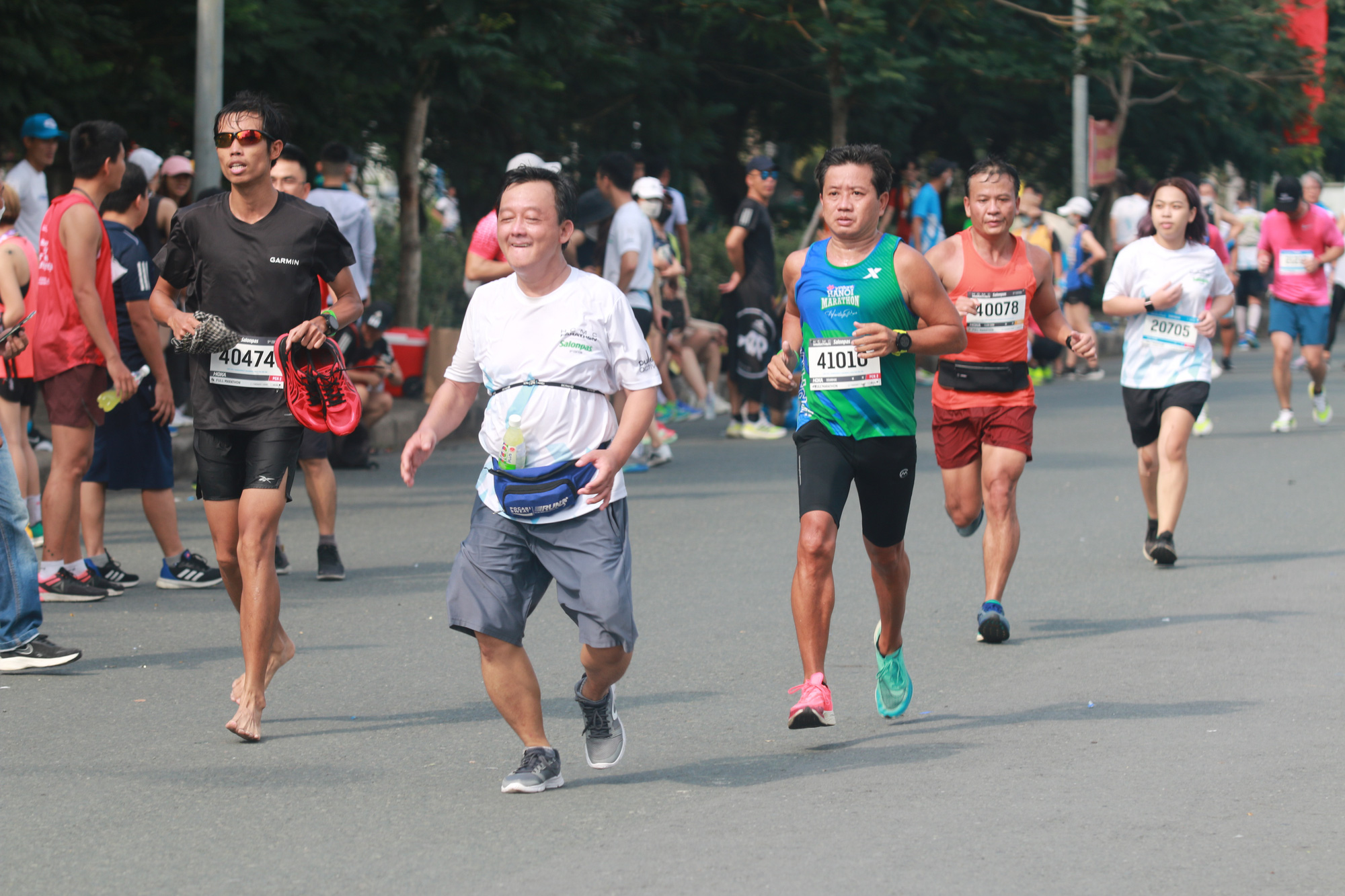 Huy chương mạ v&agrave;ng cho nh&agrave; v&ocirc; địch HCMC Marathon 2022 - Ảnh 7.