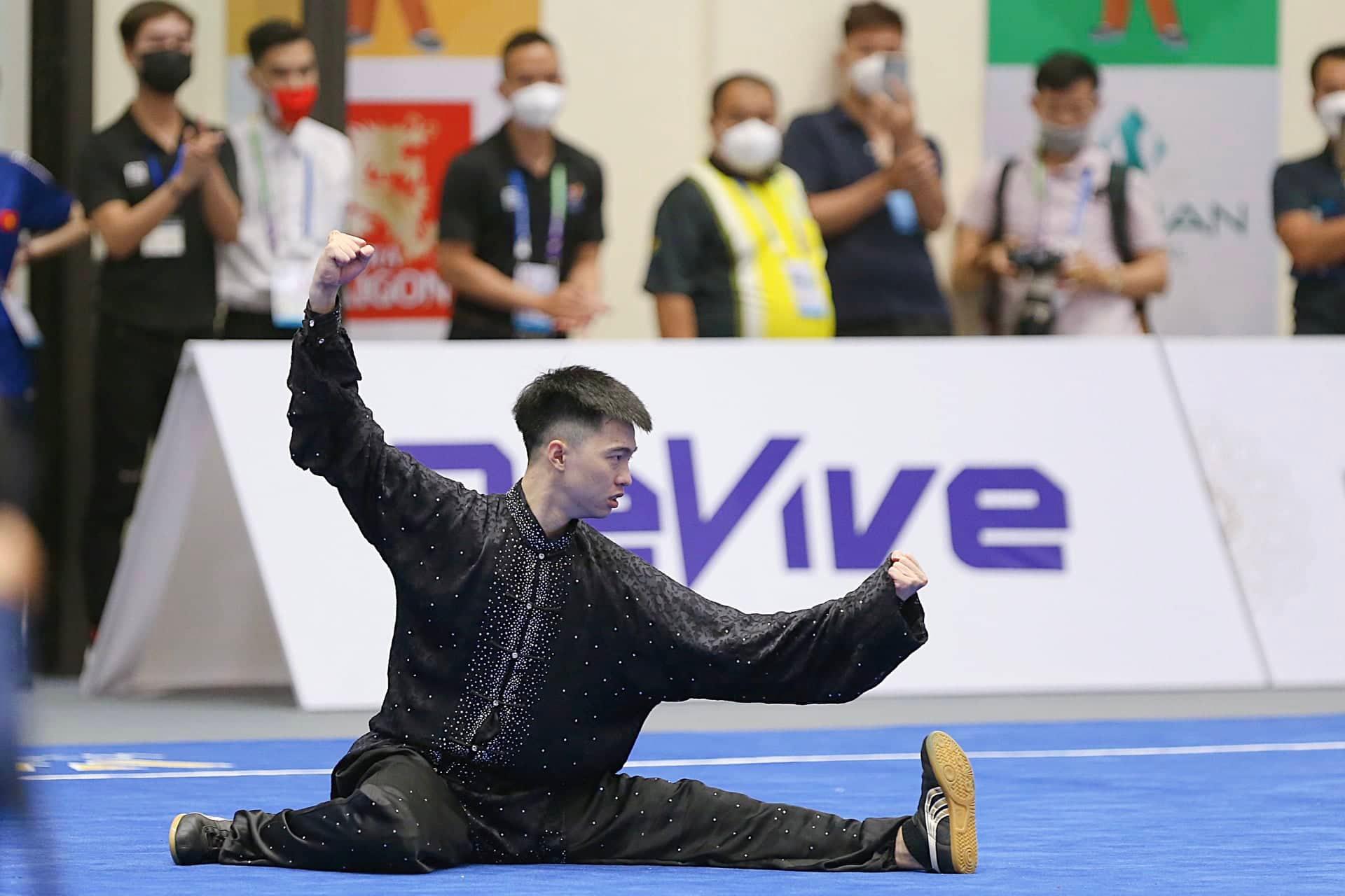 SEA Games 31: VĐV m&ocirc;n wushu của Việt Nam chấn thương khi đang thi đấu - Ảnh 4.