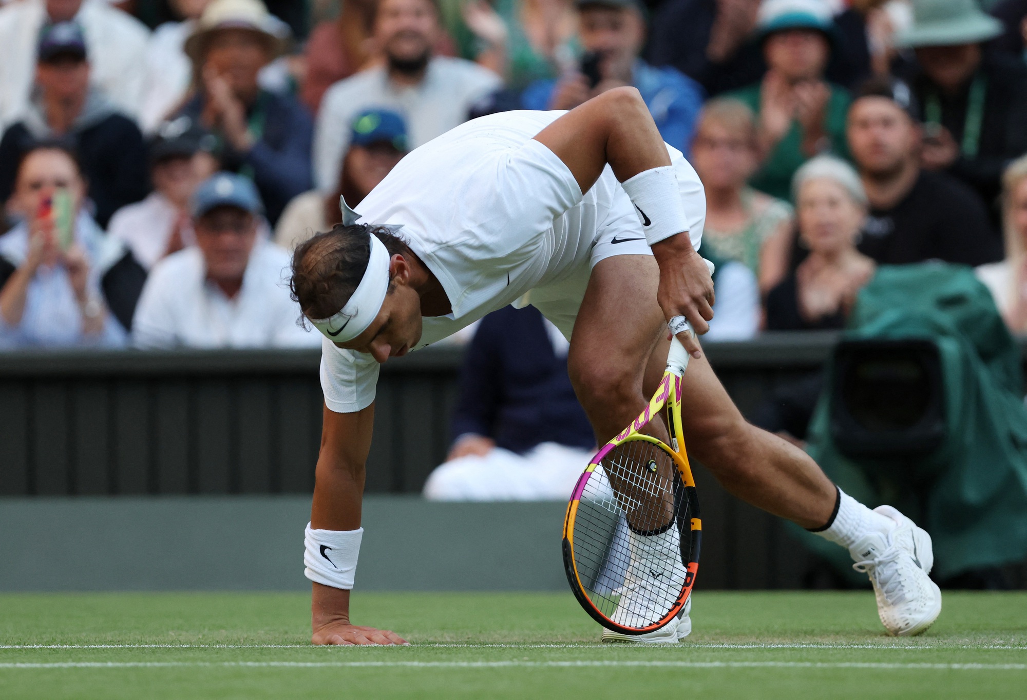 Nadal t&aacute;i đấu m&aacute;y bắn b&oacute;ng người Mỹ ở tứ kết Wimbledon 2022 - Ảnh 2.