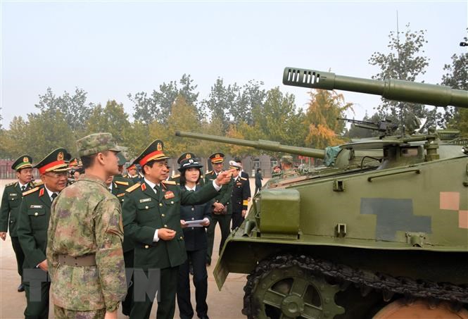 Đại tướng Phan Văn Giang n&ecirc;u ch&iacute;nh s&aacute;ch 4 kh&ocirc;ng tại diễn đ&agrave;n ở Trung Quốc - Ảnh 3.