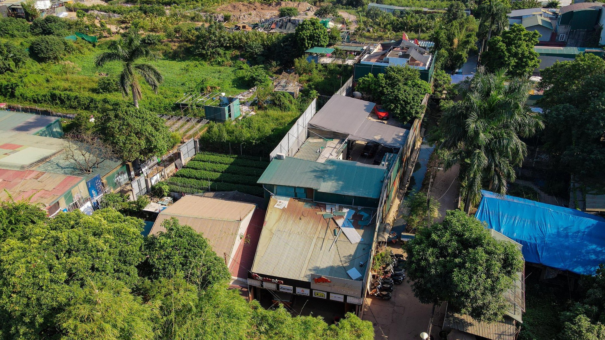 Hàng ngàn m2 đất nông nghiệp sát hồ Tây biến thành gara ôtô, nhà ở - Ảnh 5.