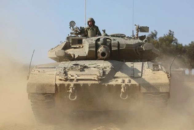 Israel đến cửa ng&otilde; của TP Gaza, đụng độ  dữ dội - Ảnh 1.