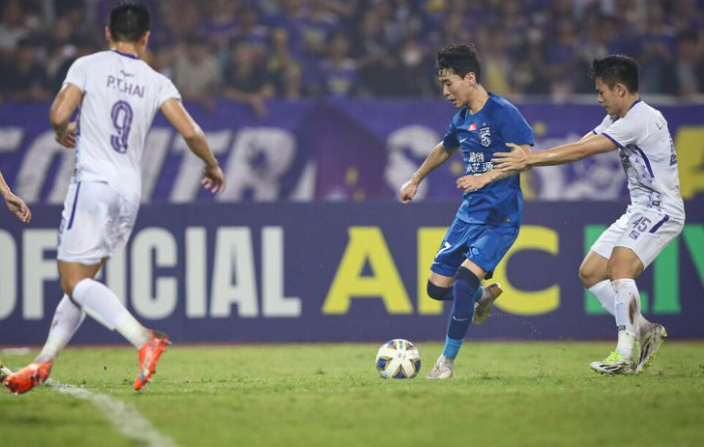 Tuấn Hải lập c&uacute; đ&uacute;p, H&agrave; Nội FC thắng ngược nh&agrave; v&ocirc; địch Trung Quốc - Ảnh 2.