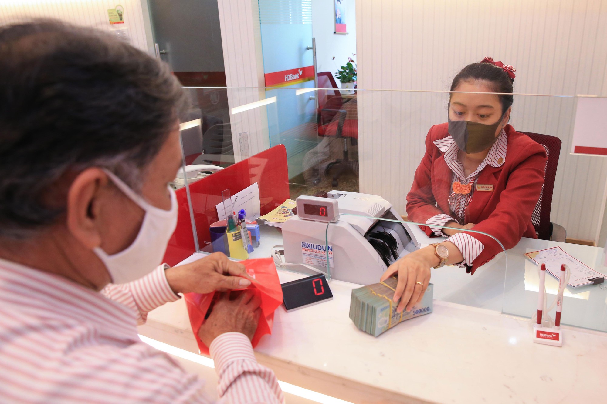 Khơi thông tín dụng cho sản xuất - kinh doanh- Ảnh 4.