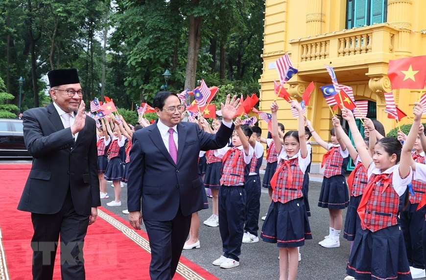 Thủ tướng Phạm Minh Ch&iacute;nh đ&oacute;n, hội đ&agrave;m với Thủ tướng Malaysia - Ảnh 5.