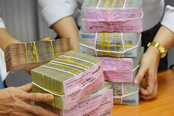 Luật C&aacute;c tổ chức t&iacute;n dụng (sửa đổi) được kỳ vọng sẽ gi&uacute;p hạn chế t&igrave;nh trạng thao t&uacute;ng dẫn đến rủi ro lớn cho hệ thống ng&acirc;n h&agrave;ngẢnh: TẤN THẠNH
