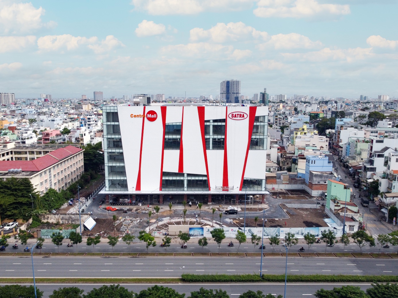 A building with a lot of buildings in the background Description automatically generated