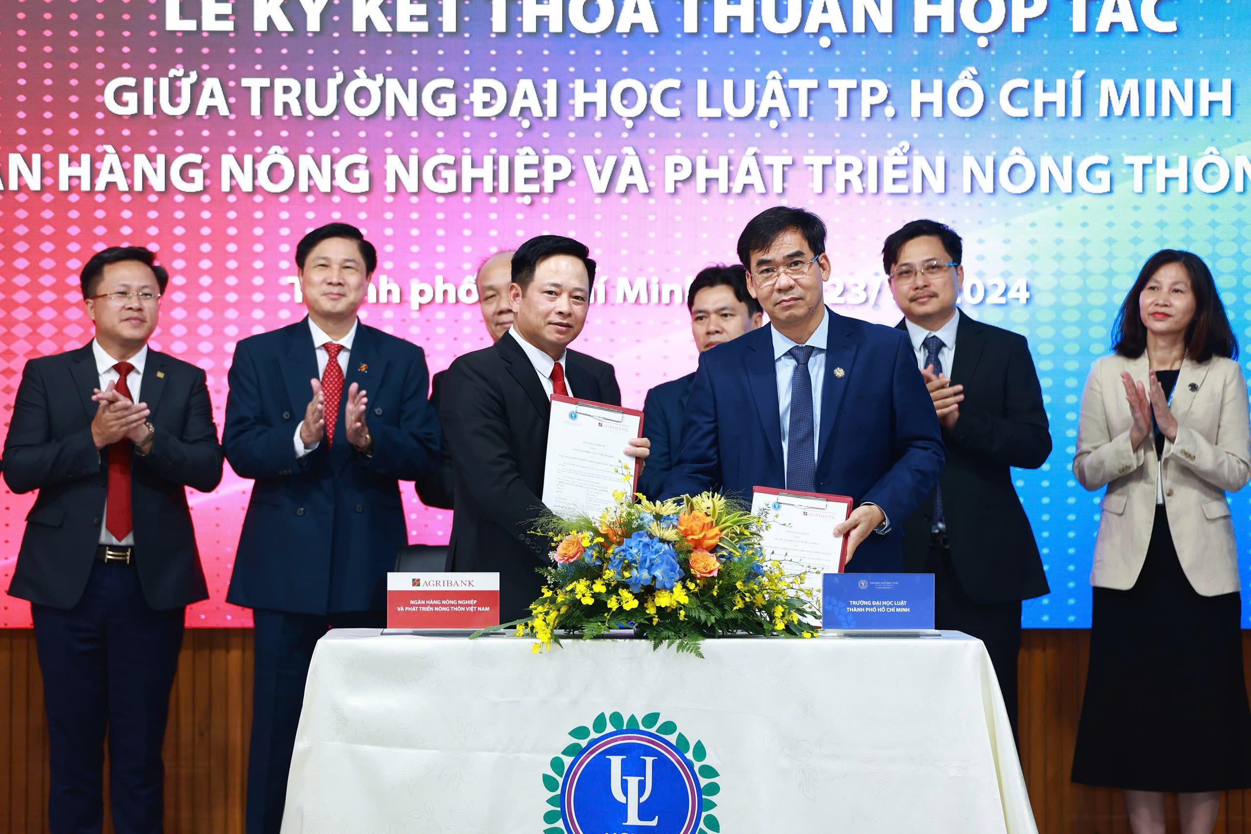 Trường ĐH Luật TP HCM hợp t&aacute;c đ&agrave;o tạo v&agrave; nghi&ecirc;n cứu khoa học ng&agrave;nh ng&acirc;n h&agrave;ng- Ảnh 1.
