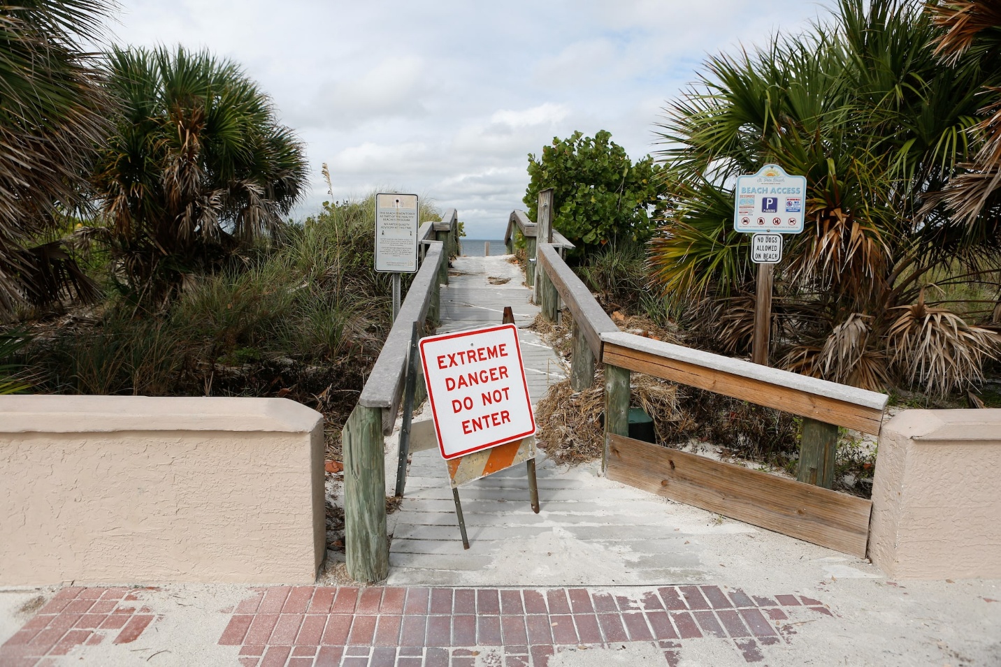 A sign is seen at the entrance to the beach before the arrival of Hurricane Milton, in St. Pete Beach, Florida