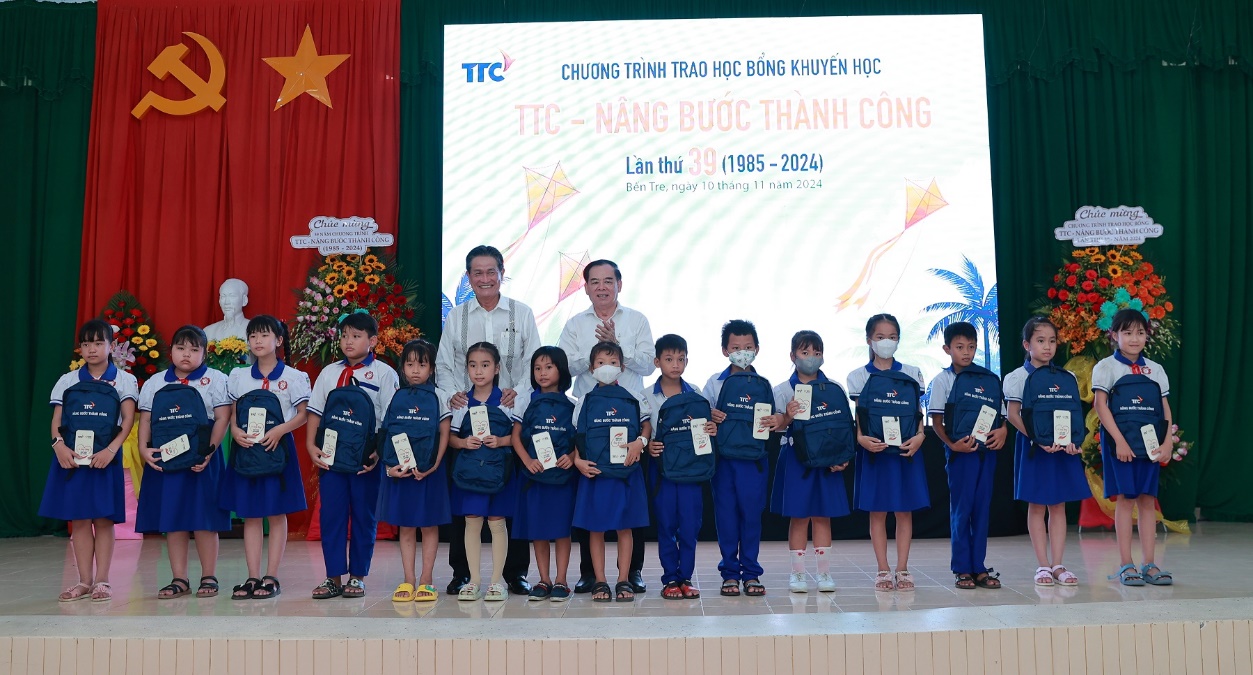 A group of children on a stage Description automatically generated