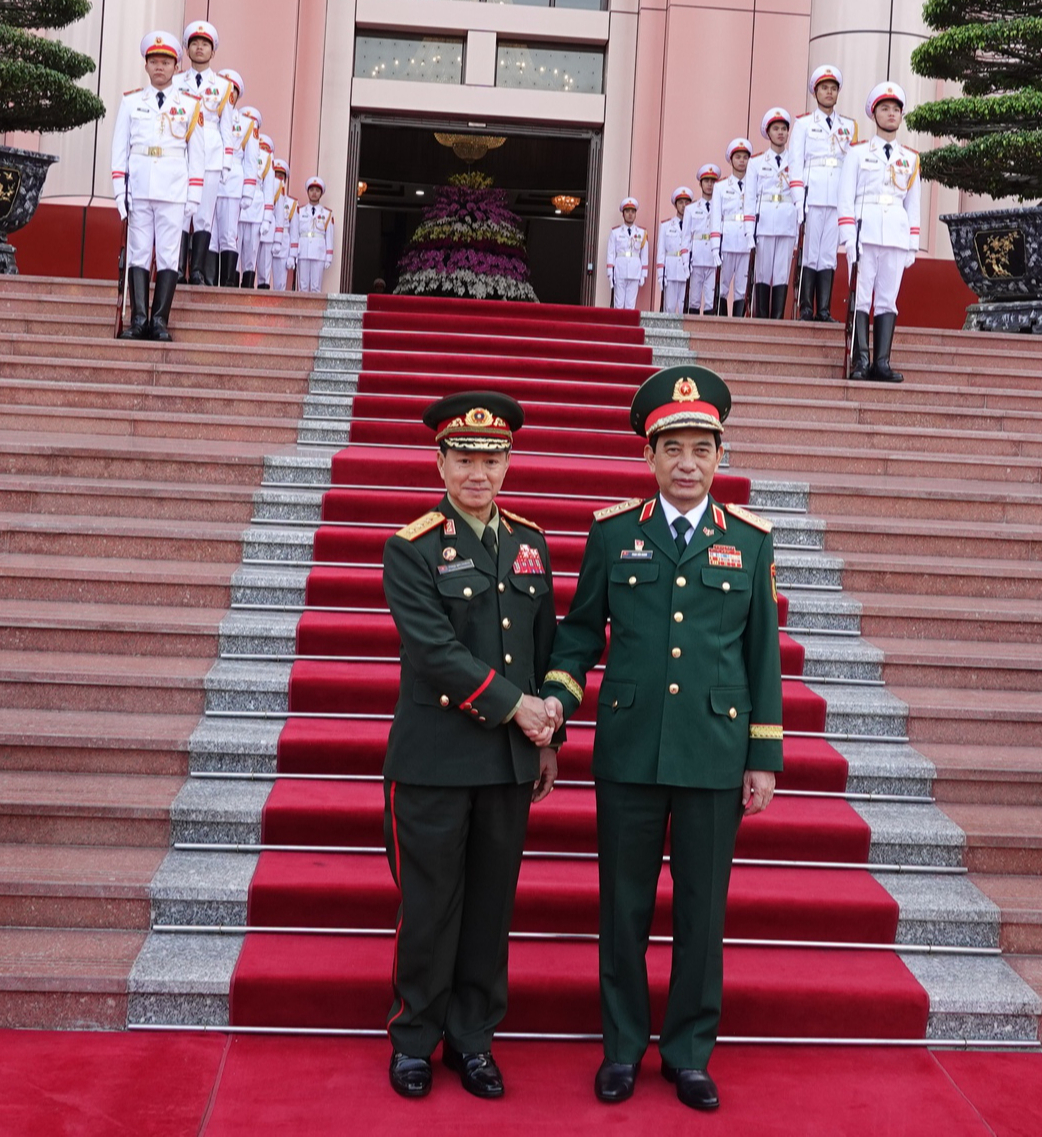 Đại tướng Phan Văn Giang đón Bộ trưởng Quốc phòng Lào thăm chính thức Việt Nam- Ảnh 4.