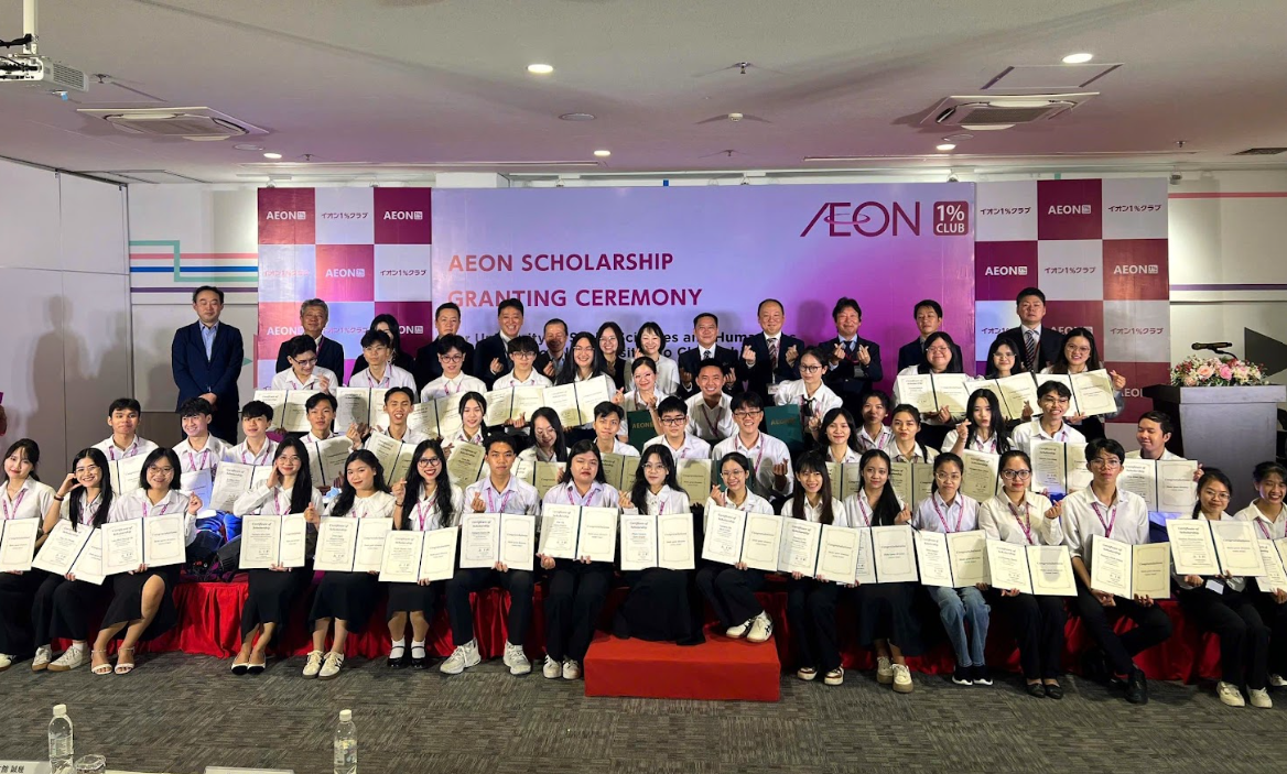 A group of people posing for a photo Description automatically generated