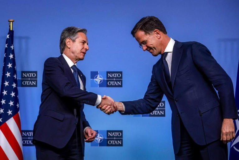 NATO Secretary General Mark Rutte (R) welcomes U.S. Secretary of State Antony Blinken ahead of a NATO Foreign Ministers' meeting in Brussels, Belgium, on Tuesday. Olivier Hoslet/EPA-EFE
