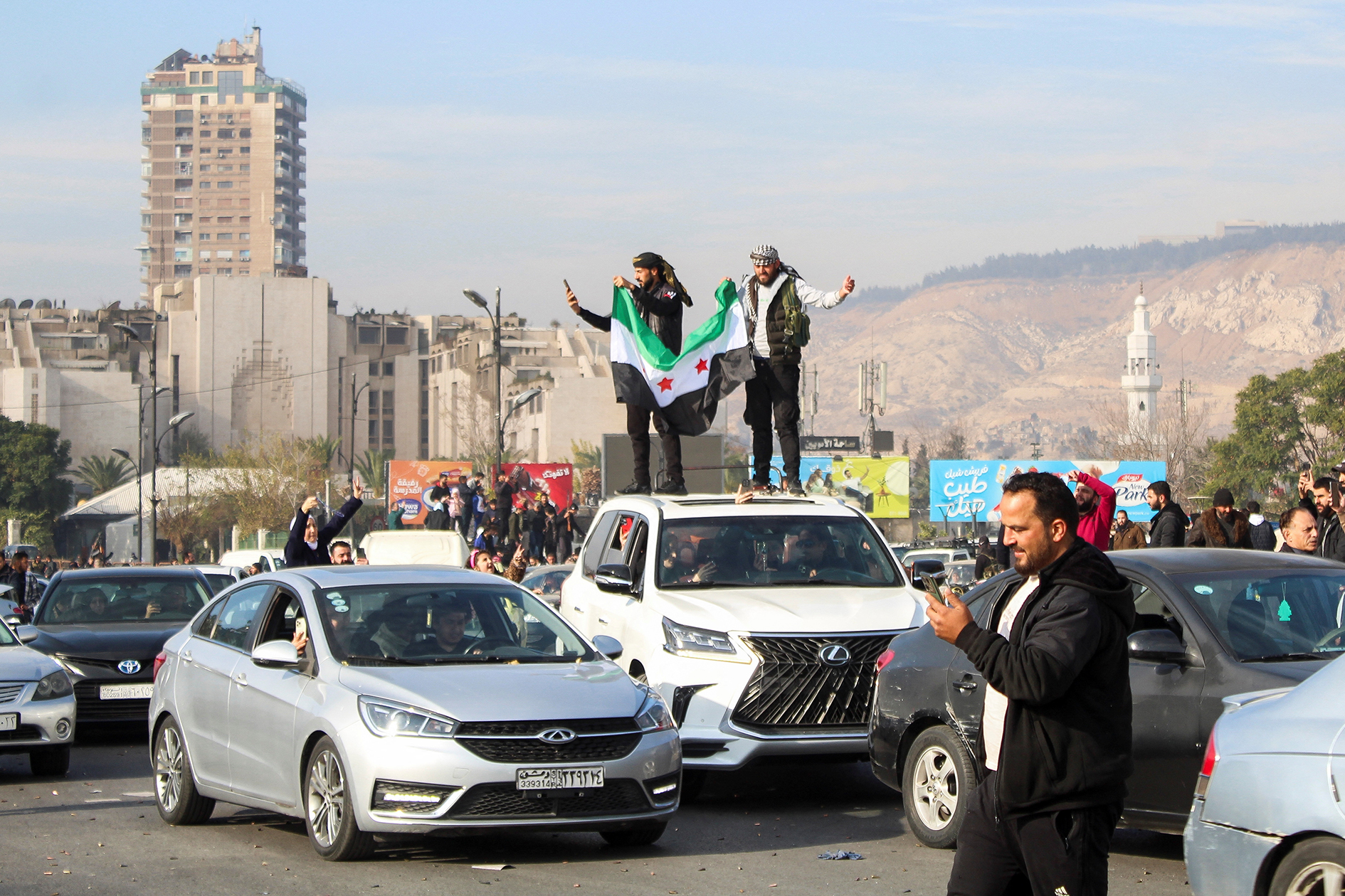 Khung cảnh tại thủ đ&ocirc; Damascus - Syria ng&agrave;y 8-12Ảnh: Reuters