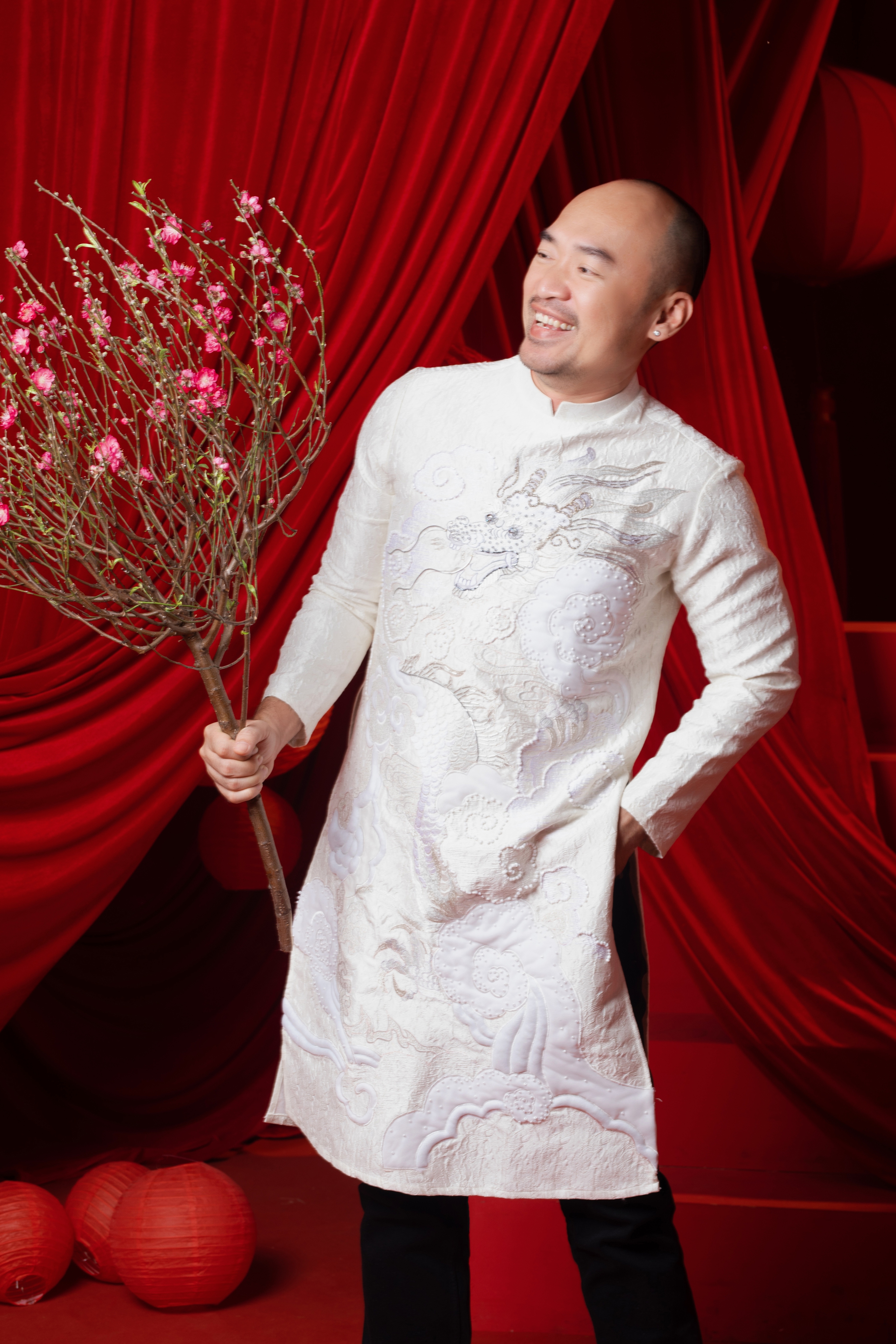 Gia đình Thu Trang - Tiến Luật diện áo dài mừng Xuân- Ảnh 2.
