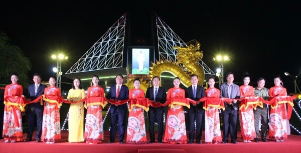 A group of people standing on a stage  Description automatically generated