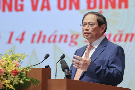 Thủ tướng Phạm Minh Ch&iacute;nh chủ tr&igrave; hội nghị ng&agrave;y 14-3Ảnh: NHẬT BẮC