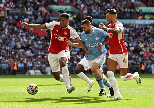Arsenal c&oacute; khả năng chạm tr&aacute;n Man City ở tứ kết Champions LeagueẢnh: REUTERS