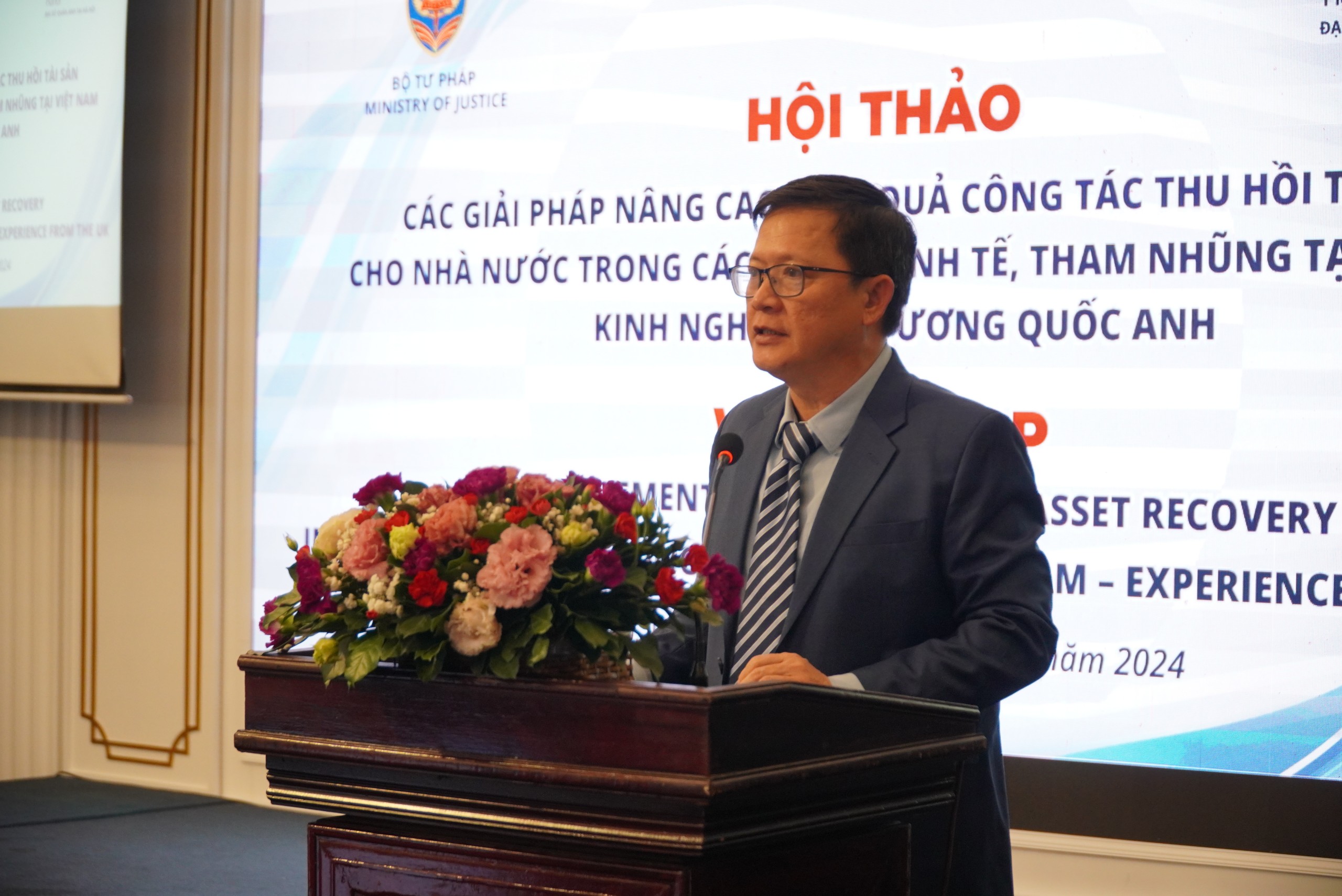 Bộ Tư ph&aacute;p chia sẻ kinh nghiệm thu hồi t&agrave;i sản từ c&aacute;c vụ &aacute;n kinh tế, tham nhũng của Anh tại TP HCM- Ảnh 1.