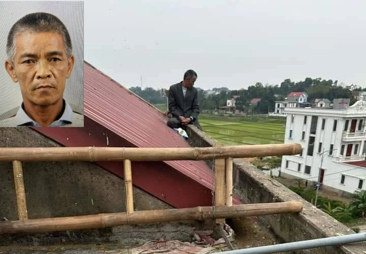 Người đàn ông đâm vợ và mẹ vợ rồi cố thủ trên nóc nhà nghỉ- Ảnh 1.