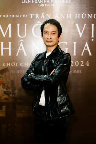 Đạo diễn Trần Anh H&ugrave;ng tại buổi ra mắt phim &ldquo;Mu&ocirc;n vị nh&acirc;n gian&rdquo;. (Ảnh do nh&acirc;n vật cung cấp)