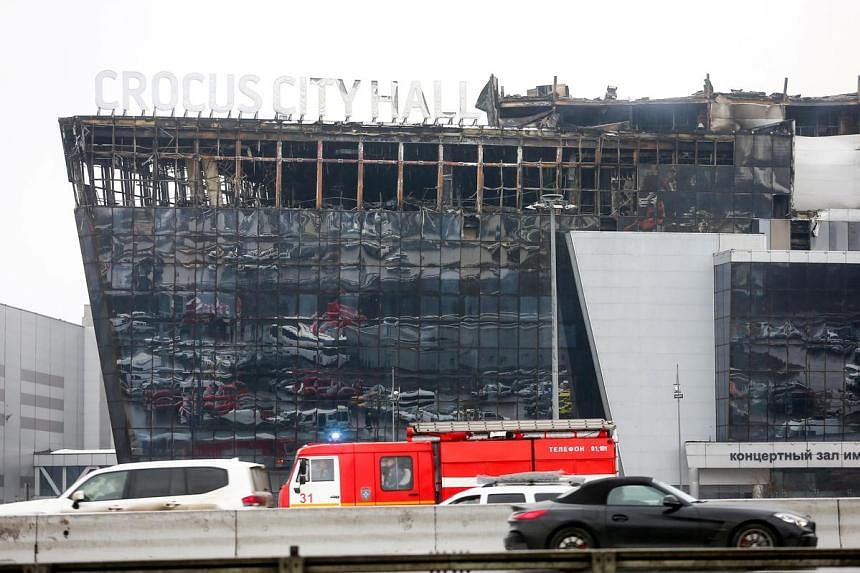 Khu phức hợp Crocus City Hall gần Moscow sau vụ tấn c&ocirc;ng khủng bố h&ocirc;m 22-3. Ảnh: Reuters