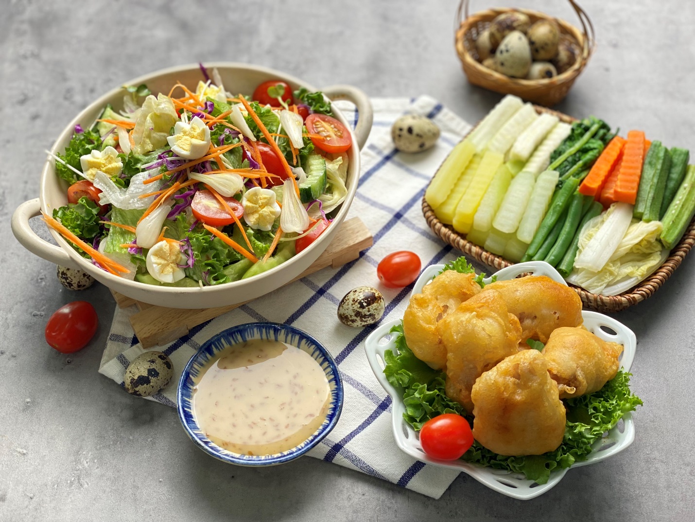 A plate of salad and vegetables Description automatically generated