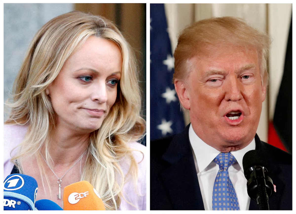 &Ocirc;ng Trump (phải) v&agrave; b&agrave; Daniels. Ảnh: Reuters