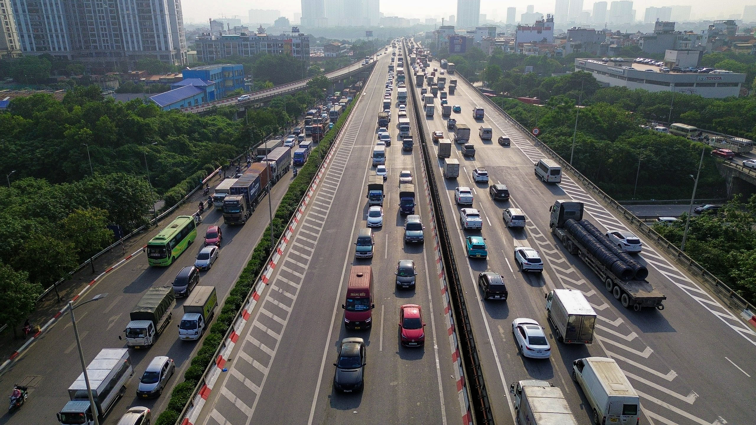 Người dân đổ về quê khiến cửa ngõ thủ đô ùn tắc- Ảnh 8.