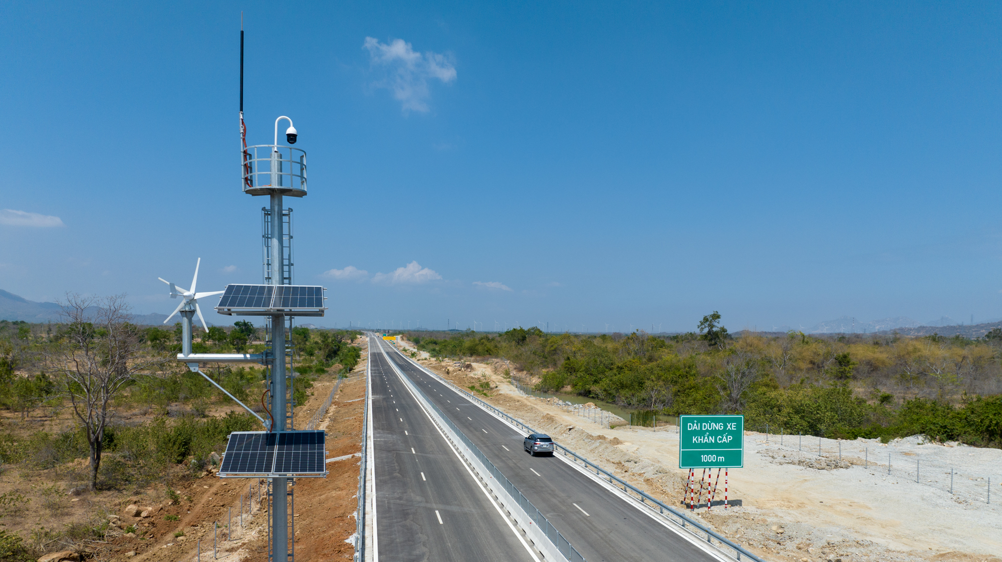 A road with a solar panel on it Description automatically generated