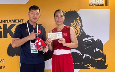 V&otilde; sĩ H&agrave; Thị Linh v&agrave; giấy th&ocirc;ng h&agrave;nh đến Olympic