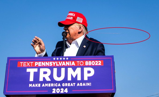 Bức ảnh có một không hai: Viên đạn bay sượt đầu ông Trump- Ảnh 1.
