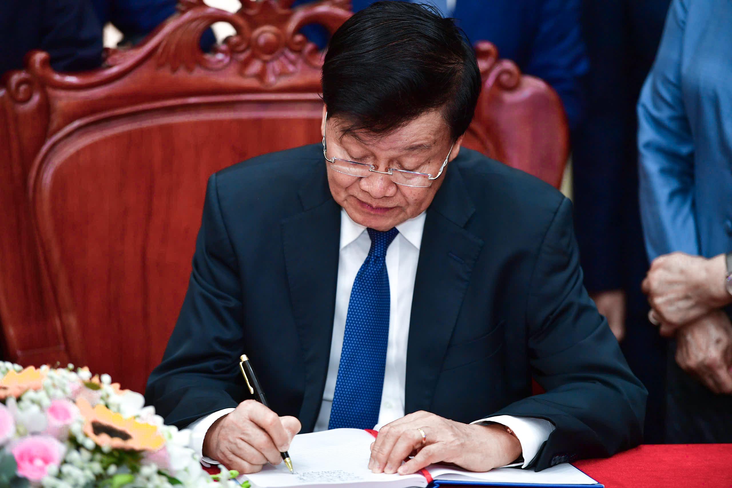 Tổng B&iacute; thư, Chủ tịch nước L&agrave;o gặp nguy&ecirc;n Chủ tịch nước Nguyễn Minh Triết v&agrave; nguy&ecirc;n Chủ tịch nước Trương Tấn Sang- Ảnh 8.