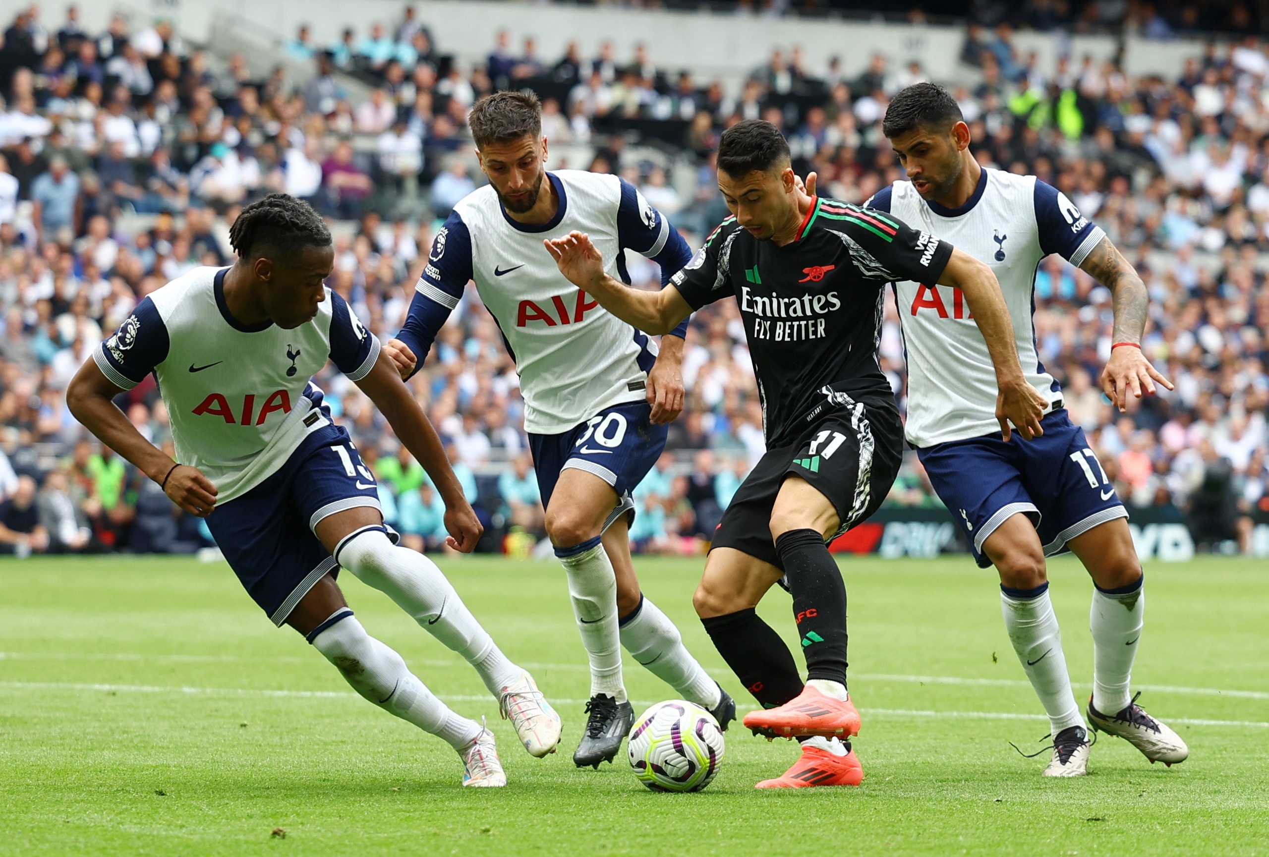 Tottenham "đá gấu" nhưng không cản được Arsenal- Ảnh 4.