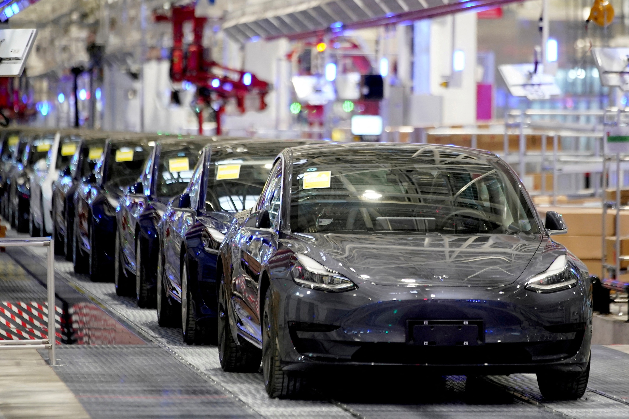 Tesla China-made Model 3 vehicles are seen during a delivery event at its factory in Shanghai, China January 7, 2020. REUTERS/Aly Song/File Photo