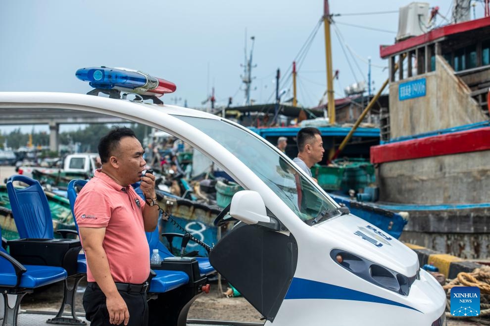 China upgrades emergency response for typhoon Yagi in Guangdong, Hainan to level II Source: XinhuaEditor: huaxia2024-09-05 20:11:30 Workers cut redundant branches of trees ahead of the landfall of typhoon Yagi in Haikou, south China's Hainan Province, Sept. 5, 2024. The State Flood Control and Drought Relief Headquarters raised its emergency response for flood and typhoon prevention from level III to level II in Guangdong and Hainan provinces at 3 p.m. Thursday, as typhoon Yagi approaches. Yagi is expected to make landfall on Friday afternoon or evening somewhere between the city of Qionghai in Hainan and Maoming City in Guangdong. (Xinhua/Guo Cheng) BEIJING, Sept. 5 (Xinhua) -- The State Flood Control and Drought Relief Headquarters raised its emergency response for flood and typhoon prevention from level III to level II in the Guangdong and Hainan provinces at 3 p.m. Thursday, as Typhoon Yagi approaches. The eye of Yagi, the 11th typhoon of the year, was located on the sea approximately 540 km southeast of Xuwen County, Guangdong Province, at 2 p.m. Thursday. Yagi is expected to make landfall on Friday afternoon or evening somewhere between the city of Qionghai in Hainan and Maoming City in Guangdong. Due to the approaching typhoon, the main section of the Hong Kong-Zhuhai-Macao Bridge will be closed temporarily from 9 p.m. Thursday, according to the bridge's emergency rescue headquarters. Affected by Yagi, parts of Guangdong and Hainan will be pounded by rainstorms from Thursday to Sunday, with daily rainfall likely to reach around 500 mm or more. All childcare institutions, kindergartens, primary and secondary schools, and secondary vocational schools in Guangdong's Zhuhai City have been asked to suspend classes, local authorities have said. China has a four-tier flood-control emergency-response system, with Level I being the most severe response. ■ A staff member reinforces a glass window in Haikou, south China's Hainan Province, Sept. 5, 2024. The State Flood Control and Drought Relief Headquarters raised its emergency response for flood and typhoon prevention from level III to level II in Guangdong and Hainan provinces at 3 p.m. Thursday, as typhoon Yagi approaches. Yagi is expected to make landfall on Friday afternoon or evening somewhere between the city of Qionghai in Hainan and Maoming City in Guangdong. (Xinhua/Guo Cheng) Workers cut redundant branches of trees ahead of the landfall of typhoon Yagi in Haikou, south China's Hainan Province, Sept. 5, 2024. The State Flood Control and Drought Relief Headquarters raised its emergency response for flood and typhoon prevention from level III to level II in Guangdong and Hainan provinces at 3 p.m. Thursday, as typhoon Yagi approaches. Yagi is expected to make landfall on Friday afternoon or evening somewhere between the city of Qionghai in Hainan and Maoming City in Guangdong. (Xinhua/Guo Cheng) The closed Dadonghai scenic area is seen in Sanya, south China's Hainan Province, Sept. 5, 2024. The State Flood Control and Drought Relief Headquarters raised its emergency response for flood and typhoon prevention from level III to level II in Guangdong and Hainan provinces at 3 p.m. Thursday, as typhoon Yagi approaches. Yagi is expected to make landfall on Friday afternoon or evening somewhere between the city of Qionghai in Hainan and Maoming City in Guangdong. (Xinhua/Zhao Yingquan) The closed Dadonghai scenic area is seen in Sanya, south China's Hainan Province, Sept. 5, 2024. The State Flood Control and Drought Relief Headquarters raised its emergency response for flood and typhoon prevention from level III to level II in Guangdong and Hainan provinces at 3 p.m. Thursday, as typhoon Yagi approaches. Yagi is expected to make landfall on Friday afternoon or evening somewhere between the city of Qionghai in Hainan and Maoming City in Guangdong. (Xinhua/Zhao Yingquan) An employee arranges a sandbag barrier ahead of the landfall of typhoon Yagi in Haikou, south China's Hainan Province, Sept. 5, 2024. The State Flood Control and Drought Relief Headquarters raised its emergency response for flood and typhoon prevention from level III to level II in Guangdong and Hainan provinces at 3 p.m. Thursday, as typhoon Yagi approaches. Yagi is expected to make landfall on Friday afternoon or evening somewhere between the city of Qionghai in Hainan and Maoming City in Guangdong. (Xinhua/Guo Cheng) A construction site is seen in Haikou, south China's Hainan Province, Sept. 5, 2024. The State Flood Control and Drought Relief Headquarters raised its emergency response for flood and typhoon prevention from level III to level II in Guangdong and Hainan provinces at 3 p.m. Thursday, as typhoon Yagi approaches. Yagi is expected to make landfall on Friday afternoon or evening somewhere between the city of Qionghai in Hainan and Maoming City in Guangdong. (Xinhua/Pu Xiaoxu) The Qilou old street is seen in Haikou, south China's Hainan Province, Sept. 5, 2024. The State Flood Control and Drought Relief Headquarters raised its emergency response for flood and typhoon prevention from level III to level II in Guangdong and Hainan provinces at 3 p.m. Thursday, as typhoon Yagi approaches. Yagi is expected to make landfall on Friday afternoon or evening somewhere between the city of Qionghai in Hainan and Maoming City in Guangdong. (Xinhua/Pu Xiaoxu) An aerial drone photo taken on Sept. 5, 2024 shows fishing ships docking at Tanmen port in Qionghai, south China's Hainan Province. The State Flood Control and Drought Relief Headquarters raised its emergency response for flood and typhoon prevention from level III to level II in Guangdong and Hainan provinces at 3 p.m. Thursday, as typhoon Yagi approaches. Yagi is expected to make landfall on Friday afternoon or evening somewhere between the city of Qionghai in Hainan and Maoming City in Guangdong. (Photo by Meng Zhongde/Xinhua) The closed Xiuying Port is seen in Haikou, south China's Hainan Province, Sept. 5, 2024. The State Flood Control and Drought Relief Headquarters raised its emergency response for flood and typhoon prevention from level III to level II in Guangdong and Hainan provinces at 3 p.m. Thursday, as typhoon Yagi approaches. Yagi is expected to make landfall on Friday afternoon or evening somewhere between the city of Qionghai in Hainan and Maoming City in Guangdong. (Xinhua/Pu Xiaoxu) A fisherman fastens a fishing boat in Boao township of Qionghai, south China's Hainan Province, Sept. 5, 2024. The State Flood Control and Drought Relief Headquarters raised its emergency response for flood and typhoon prevention from level III to level II in Guangdong and Hainan provinces at 3 p.m. Thursday, as typhoon Yagi approaches. Yagi is expected to make landfall on Friday afternoon or evening somewhere between the city of Qionghai in Hainan and Maoming City in Guangdong. (Photo by Meng Zhongde/Xinhua) A staff member makes an emergency call to remind the fishermen to make preparations for the typhoon in Tanmen township of Qionghai, south China's Hainan Province, Sept. 5, 2024. The State Flood Control and Drought Relief Headquarters raised its emergency response for flood and typhoon prevention from level III to level II in Guangdong and Hainan provinces at 3 p.m. Thursday, as typhoon Yagi approaches. Yagi is expected to make landfall on Friday afternoon or evening somewhere between the city of Qionghai in Hainan and Maoming City in Guangdong. (Photo by Meng Zhongde/Xinhua)