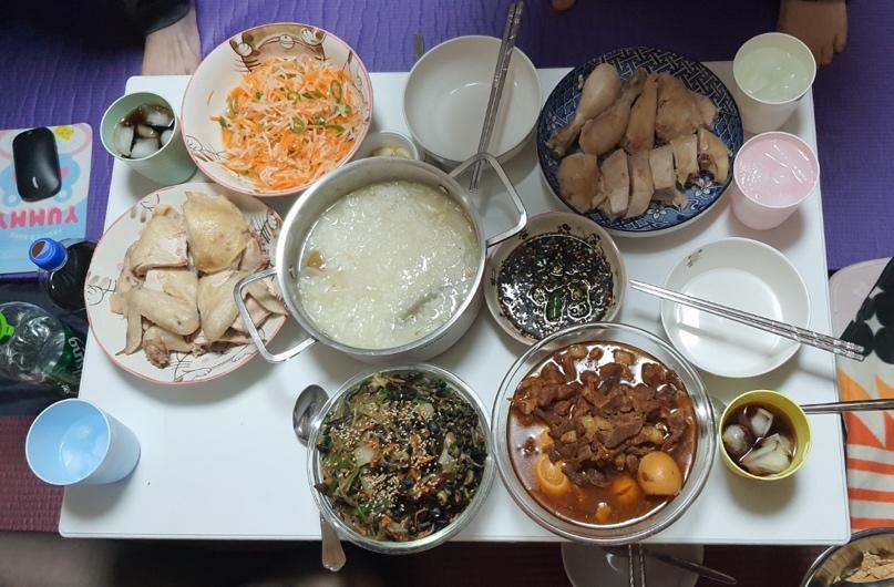 A table with different dishes on it Description automatically generated