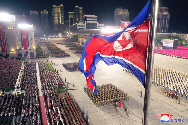 Ch&ugrave;m ảnh: Triều Ti&ecirc;n duyệt binh kỷ niệm 80 năm ng&agrave;y th&agrave;nh lập Đảng Lao động - Ảnh 1.