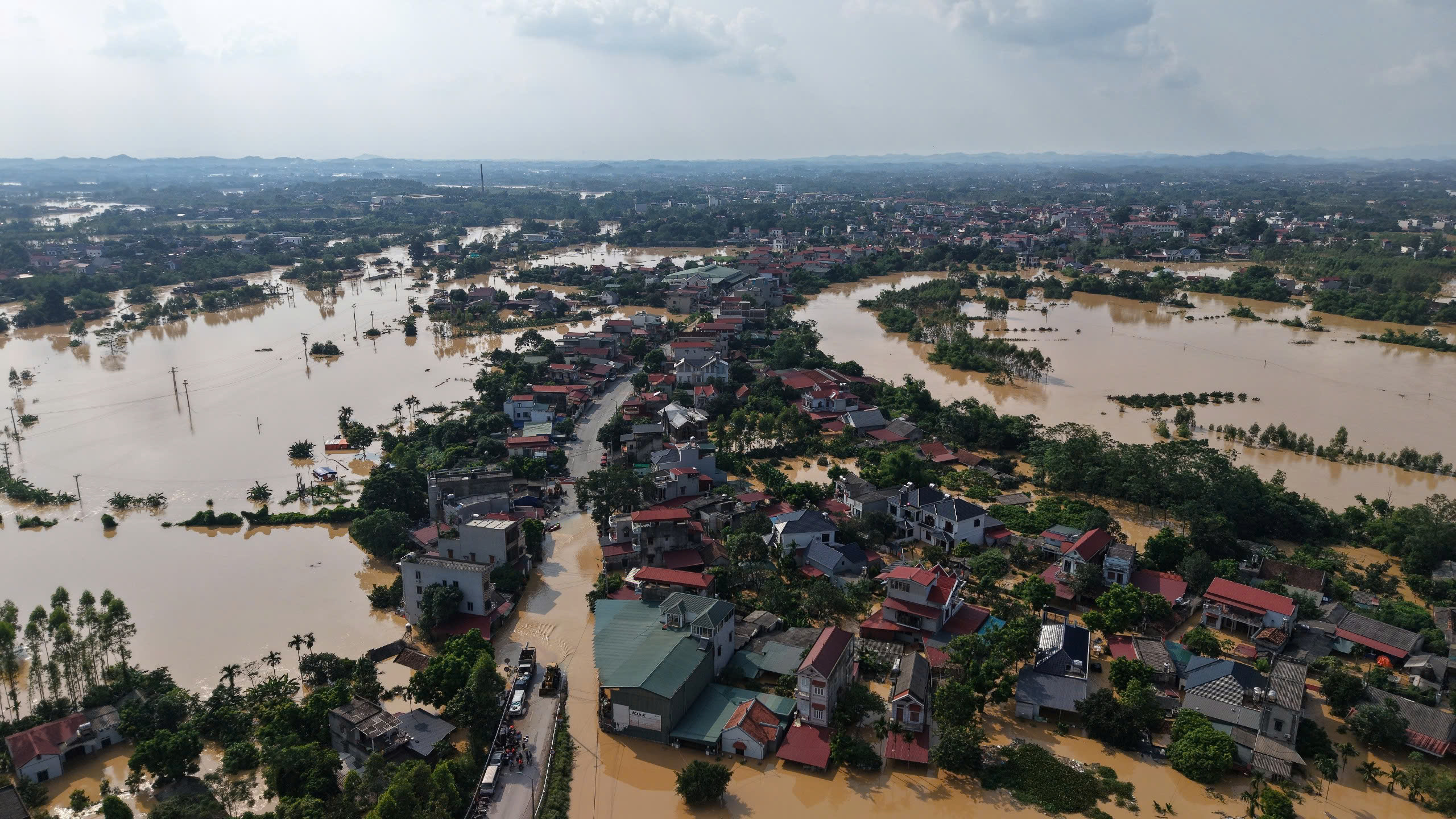 giảm thuế cho người dân sau mưa lũ - Ảnh 1.