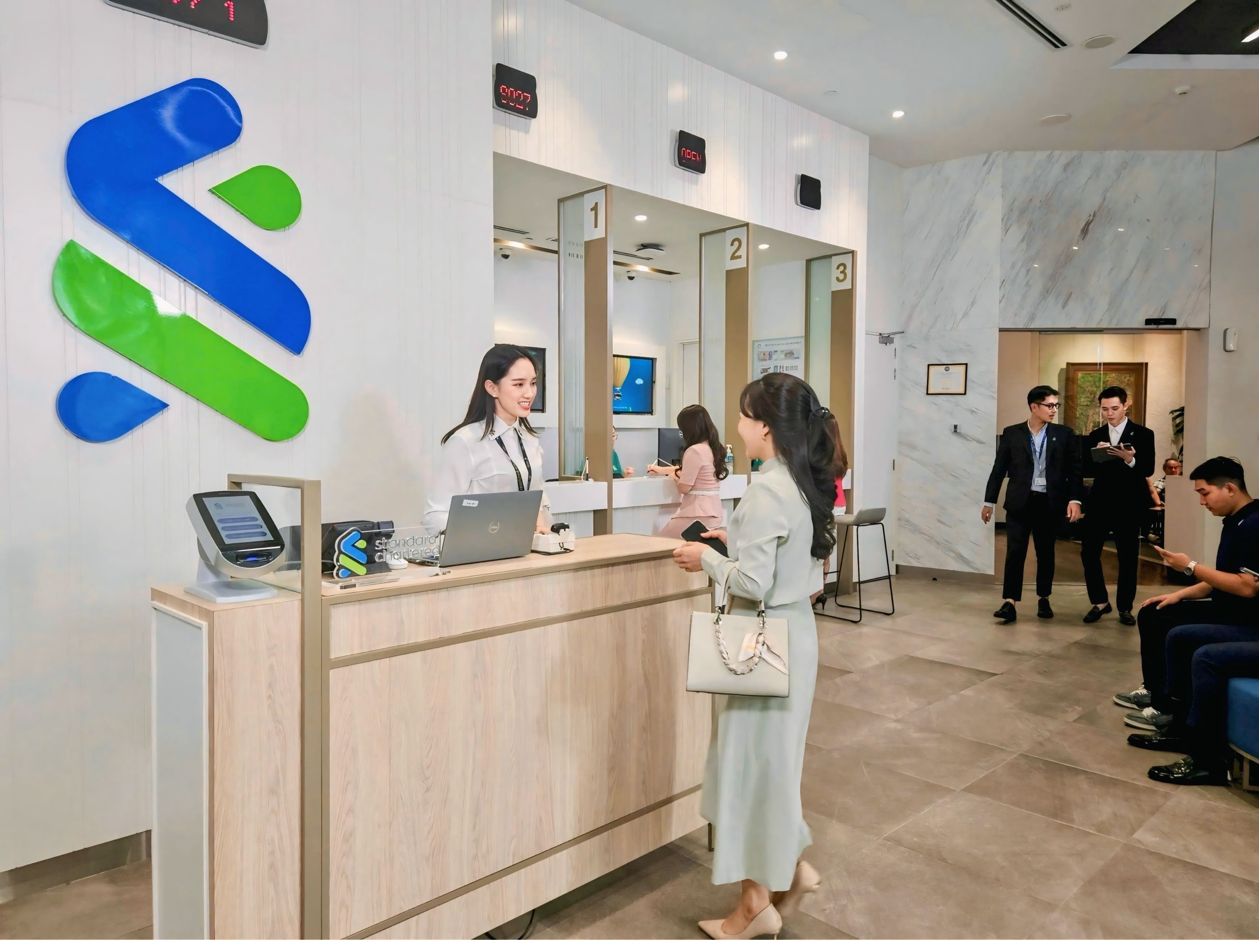 Standard Chartered dự báo mới về tăng trưởng kinh tế Việt Nam - Ảnh 1.