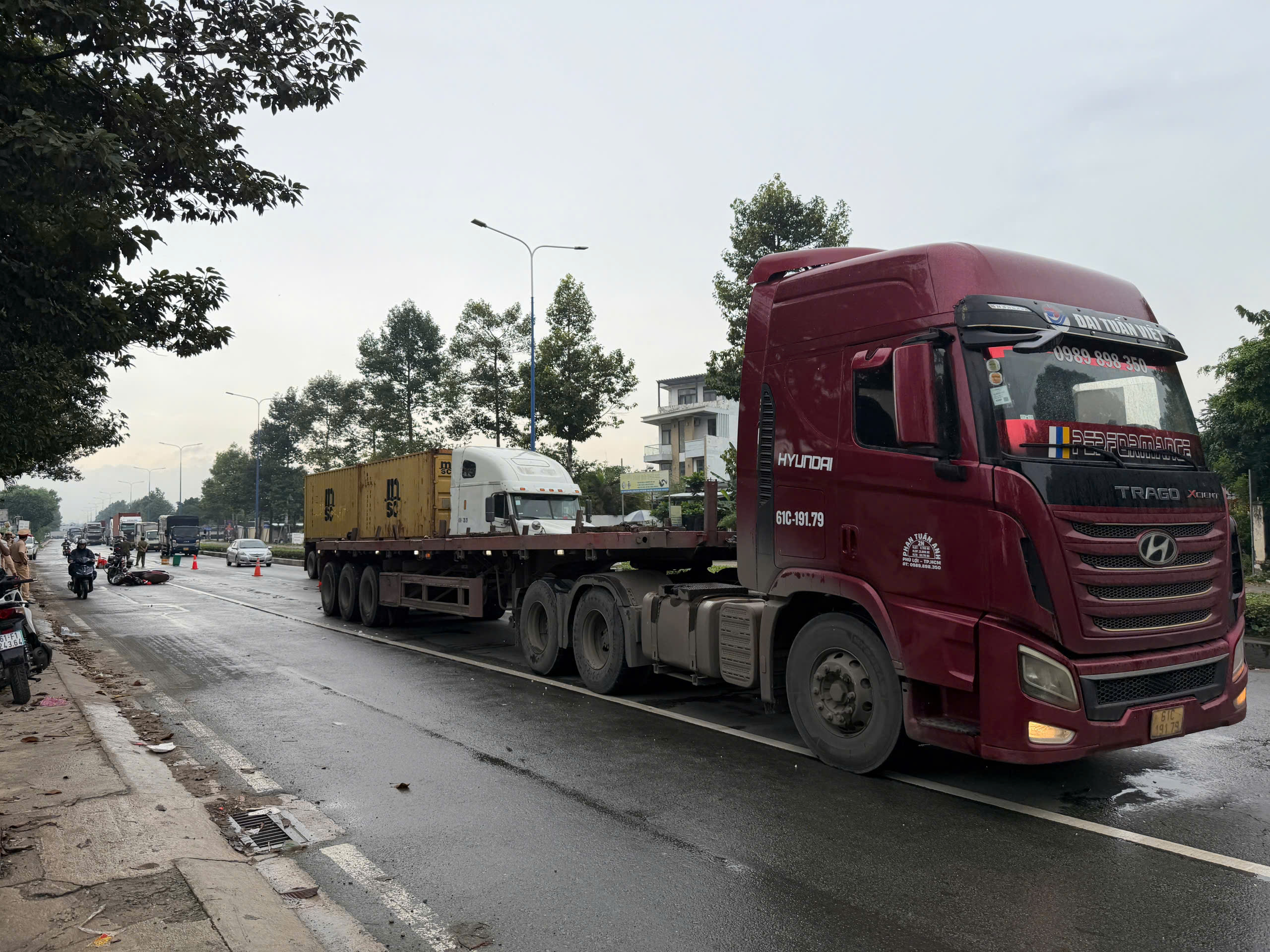 Tai nạn thương tâm trên đường Mỹ Phước - Tân Vạn khiến một người phụ nữ tử vong - Ảnh 1.