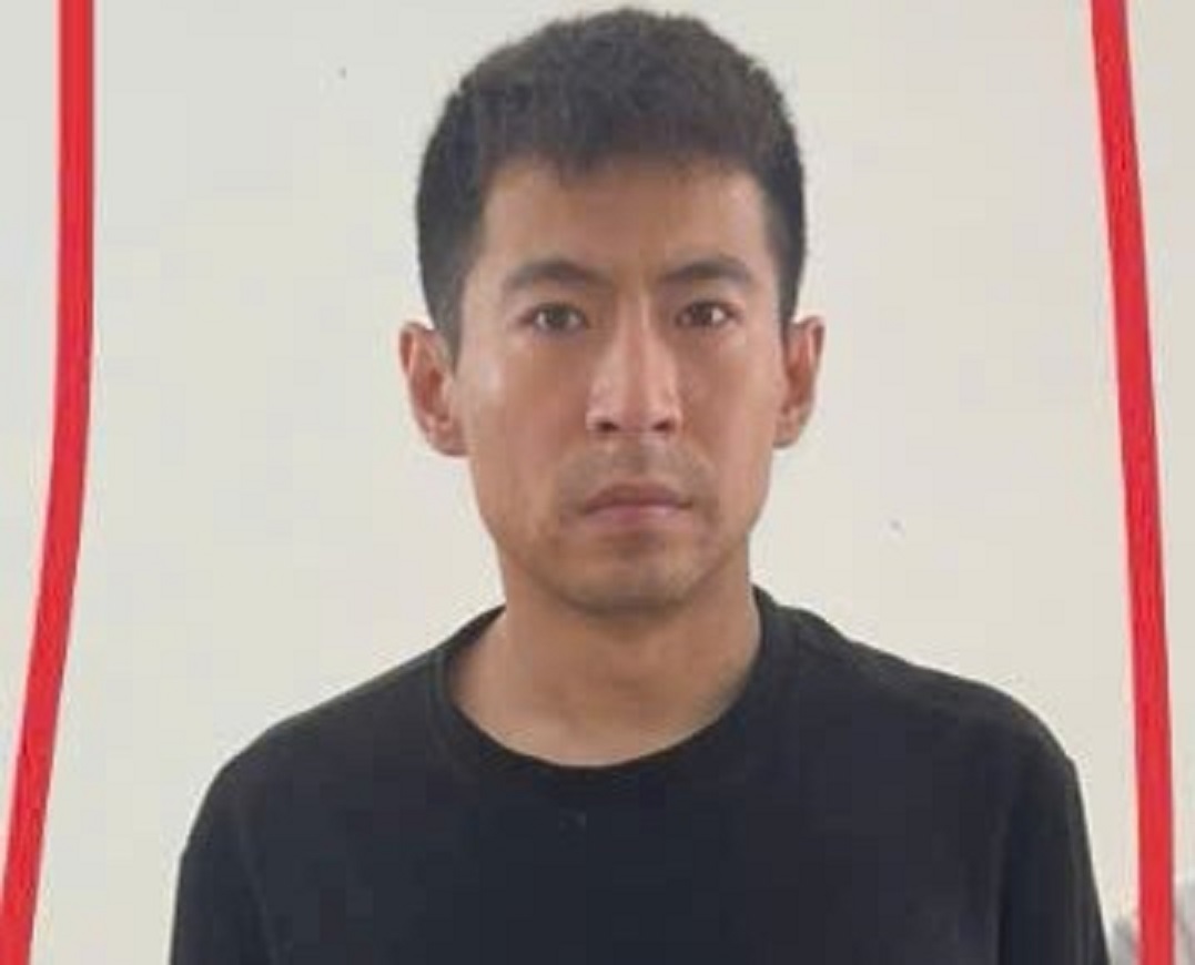 Nghi phạm Trung Quốc trốn khỏi Bệnh viện Đà Nẵng , cao khoảng 1m8 - Ảnh 1.