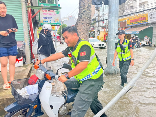 Chung sức, đồng lòng vì cộng đồng - Ảnh 1.