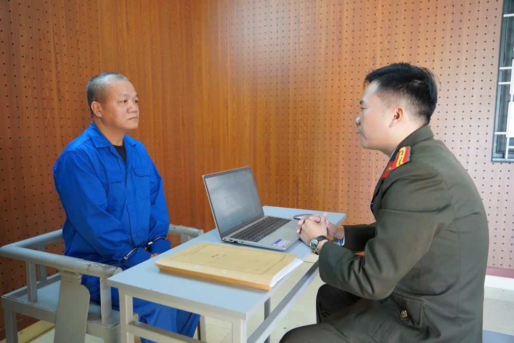 Nhóm đối tượng làm giả tài liệu cơ quan, nhà nước để chiếm đoạt tài sản - Ảnh 2.
