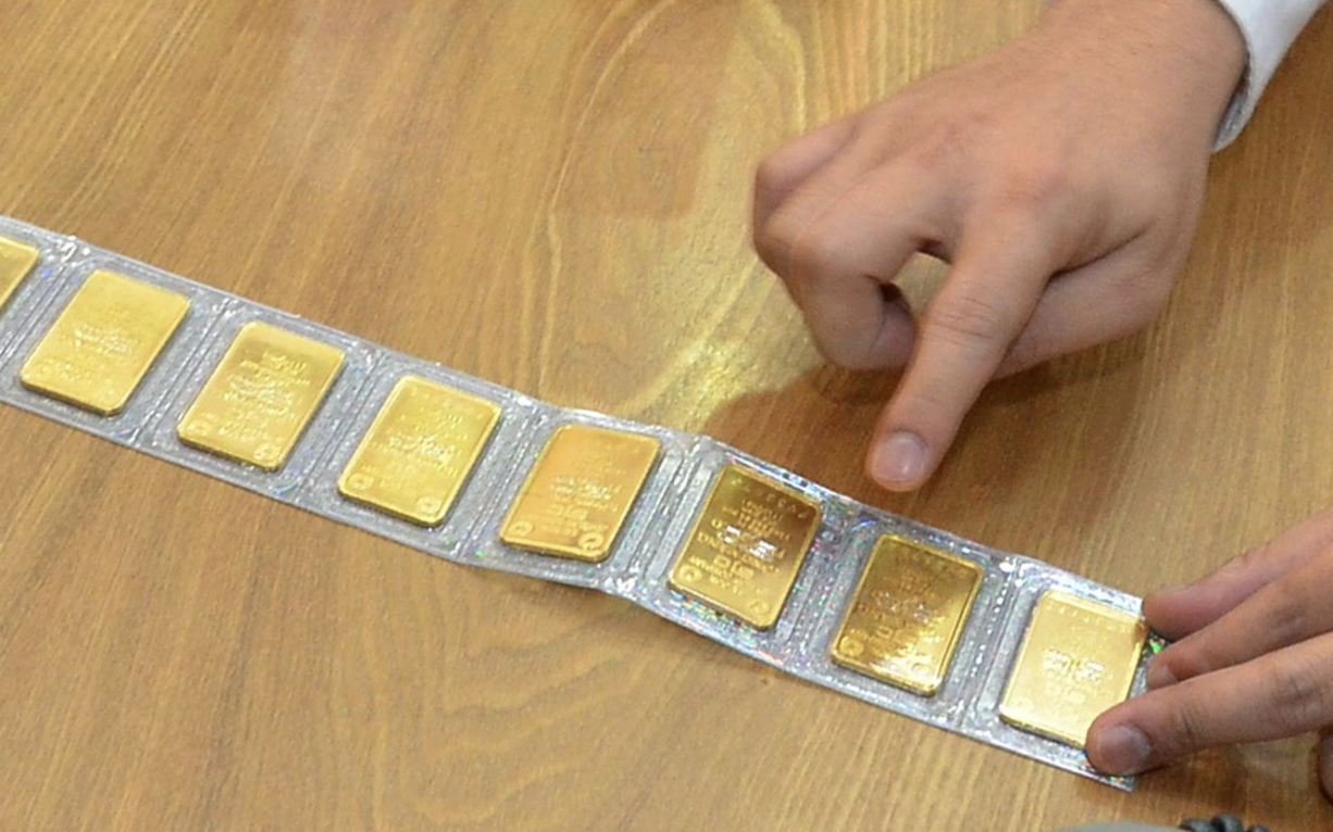 Giá vàng miếng SJC giảm nhiệt , rời mốc đỉnh lịch sử ngày 25 - 12 - Ảnh 1.