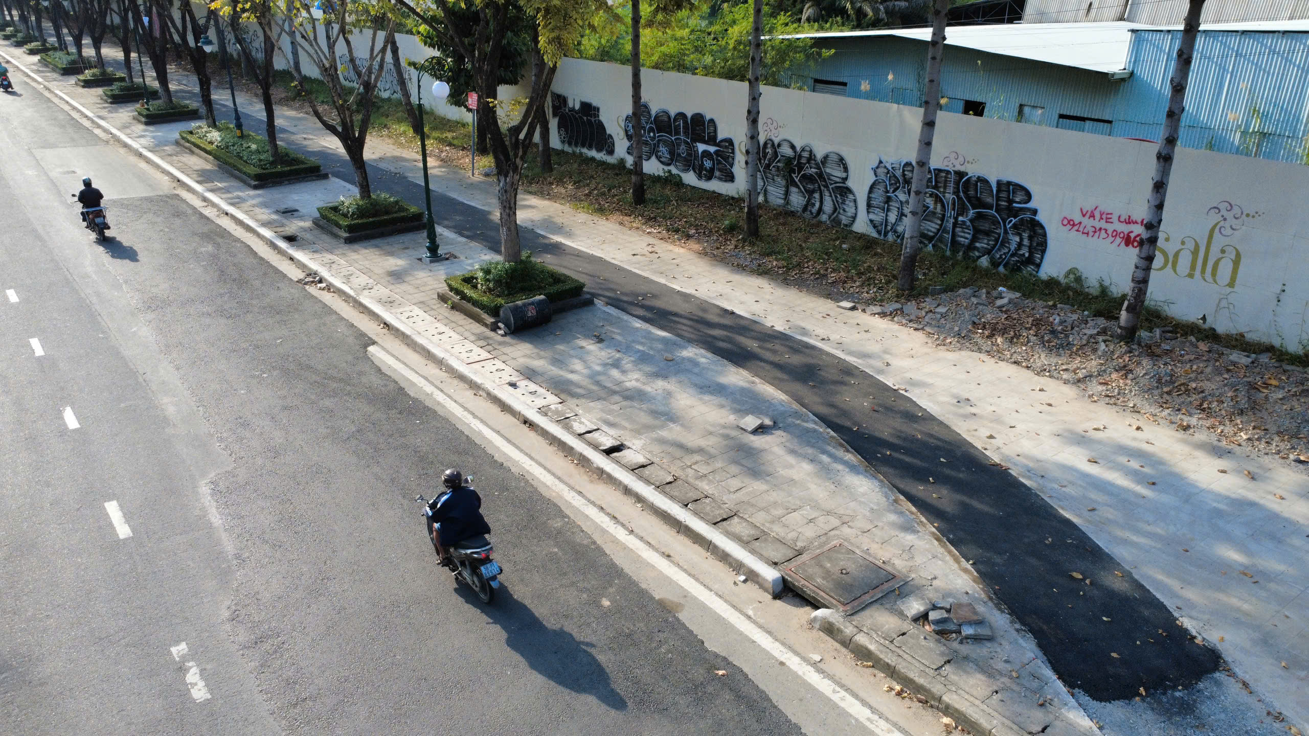 Làn xe đạp trên đường Mai Chí Thọ hoàn thành, xe máy cần tránh nếu không muốn bị phạt - Ảnh 9.