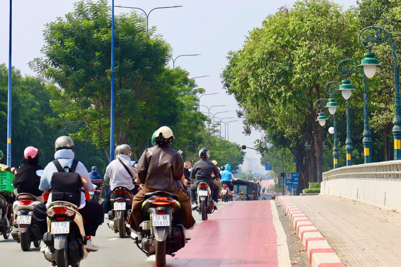 Làn xe đạp trên đường Mai Chí Thọ hoàn thành, xe máy cần tránh nếu không muốn bị phạt - Ảnh 8.